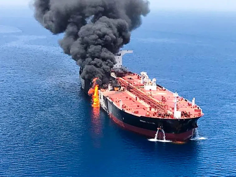 Smoke and flames rise from the Front Altair tanker on June 13.