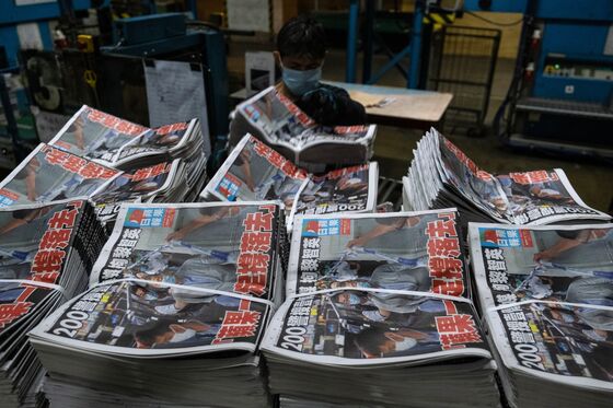 As China Hits Jimmy Lai, a Bitter Tabloid Feud May Lead to Jail
