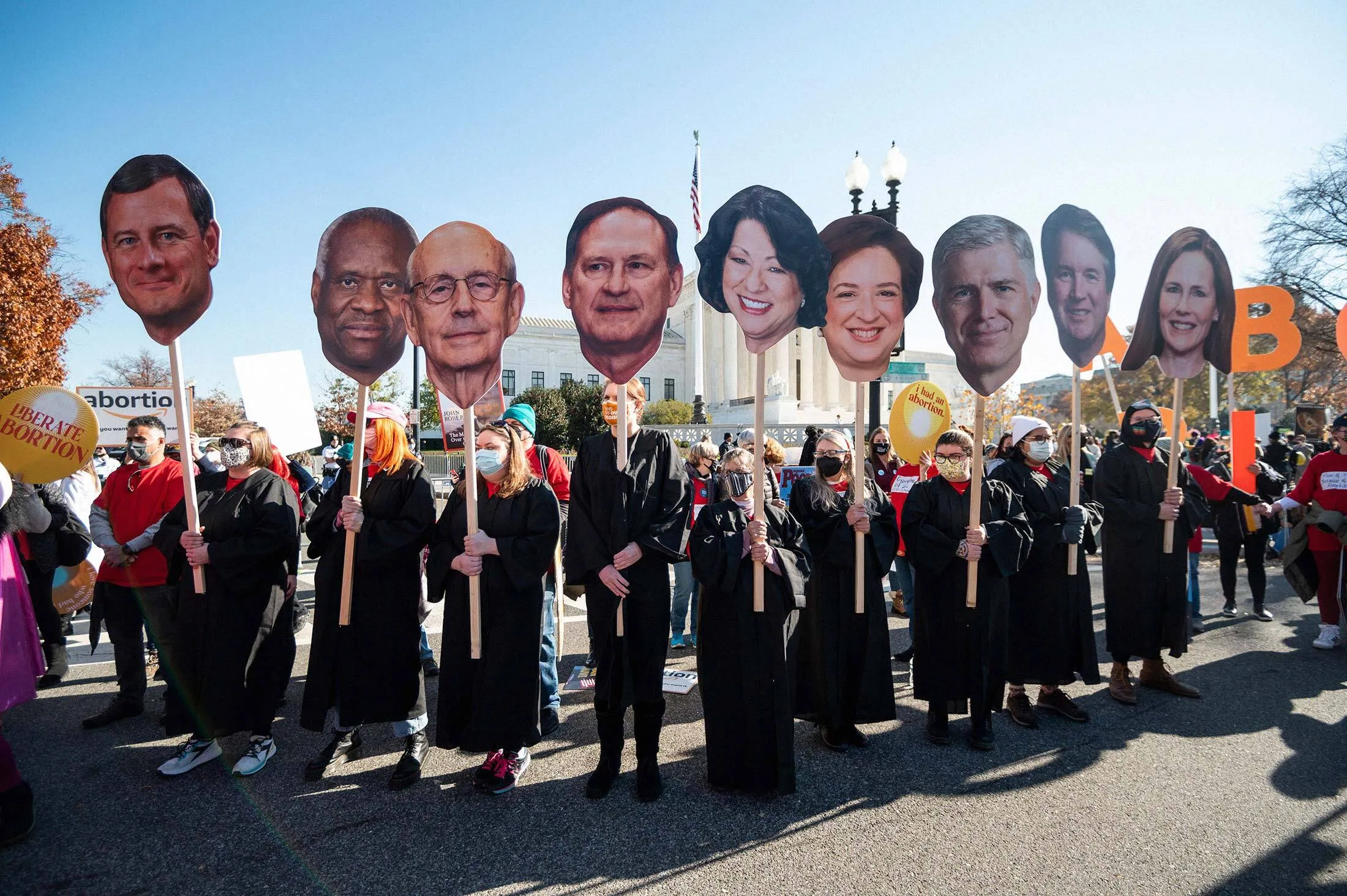 Activists in Washington during oral arguments in Dobbs v. Jackson Women’s&nbsp;Health Organization&nbsp;on Dec. 1.