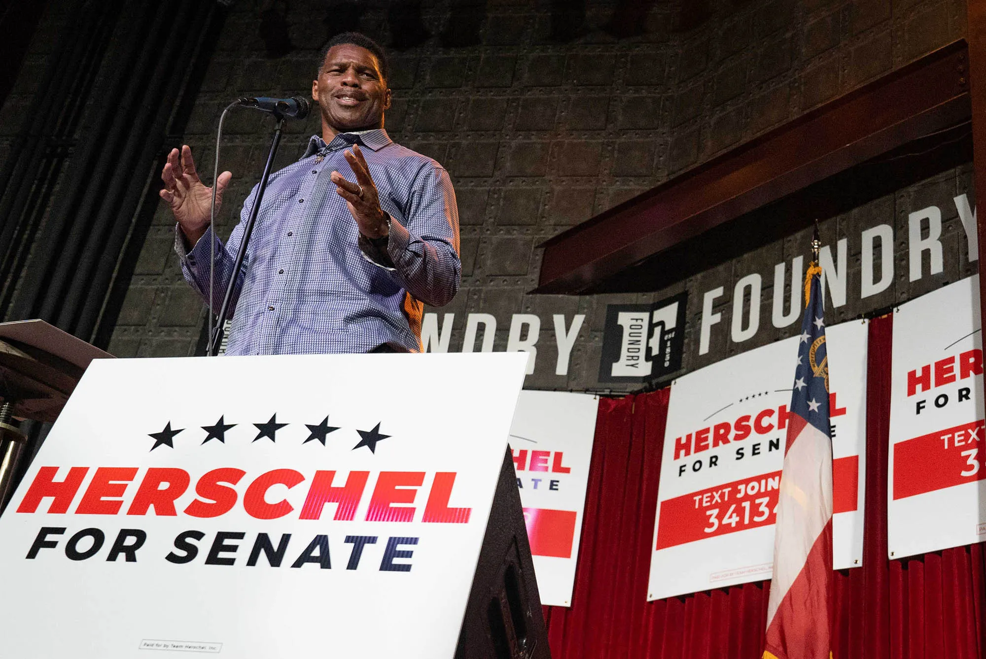 Herschel Walker speaks at a rally in Athens, Georgia.
