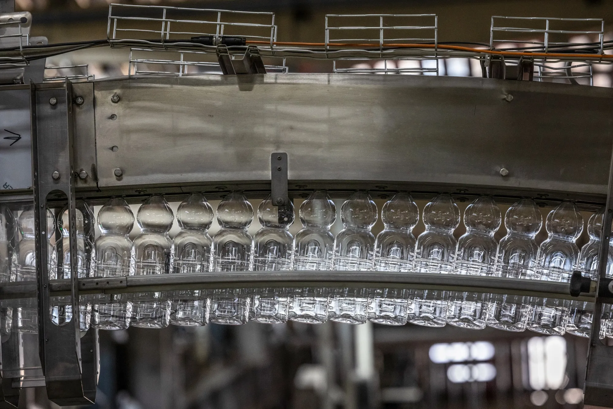 Empty plastic bottles on a&nbsp;production line.&nbsp;