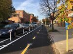 The new Maryland Avenue cycle track in Baltimore, part of the city's emerging network of protected lanes.