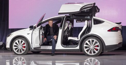 Falcon wing doors