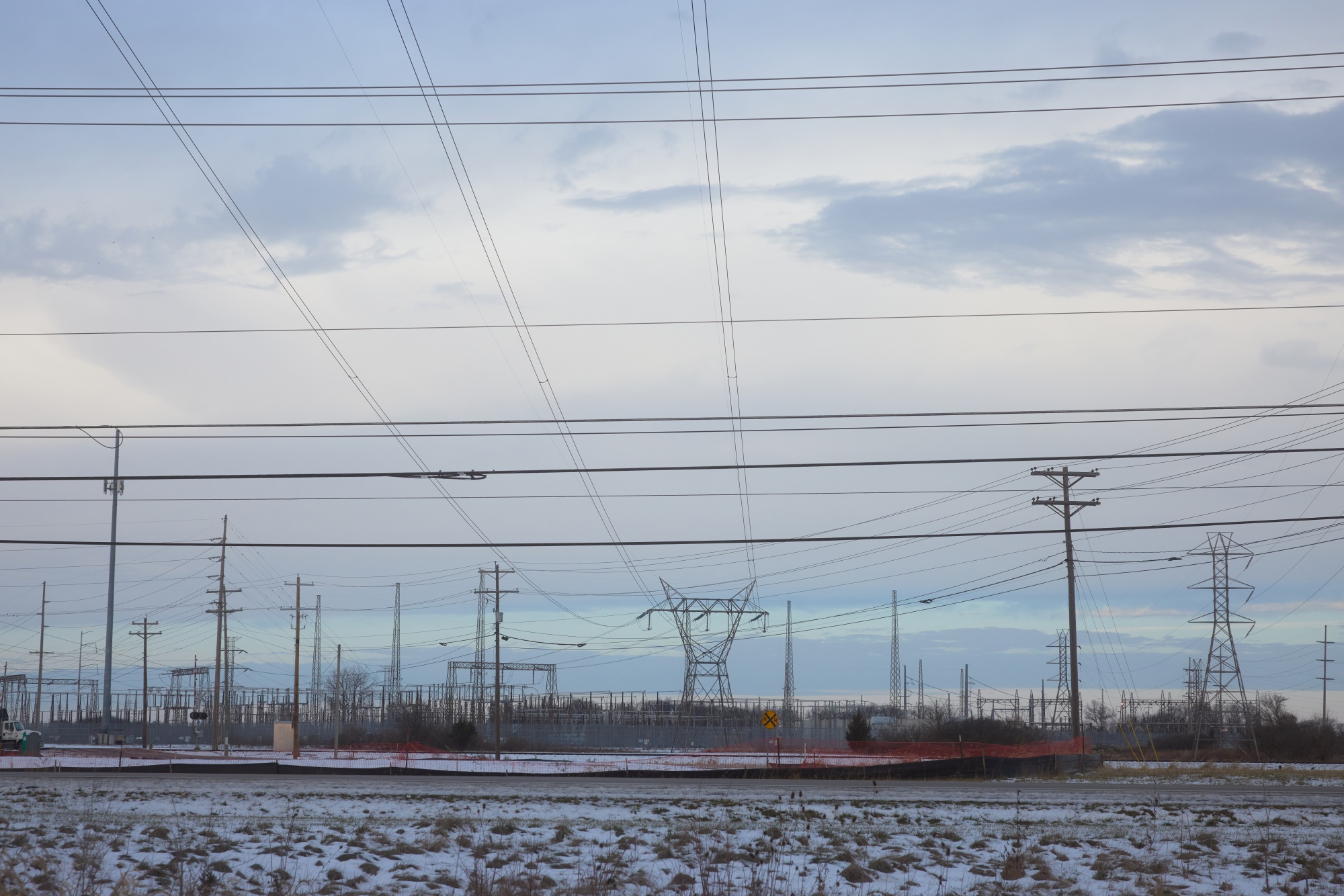 Power transmission lines and a substation in Grove City, Ohio, US, on Wednesday, Dec. 17, 2025. The outcome of what was, until recently, an obscure US power market auction will be the subject of intense interest this week for electric generators, regulators and consumers alike.