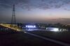 The Tesla Inc. Gigafactory stands illuminated at night in Shanghai, China, on Friday, Nov. 1, 2019.