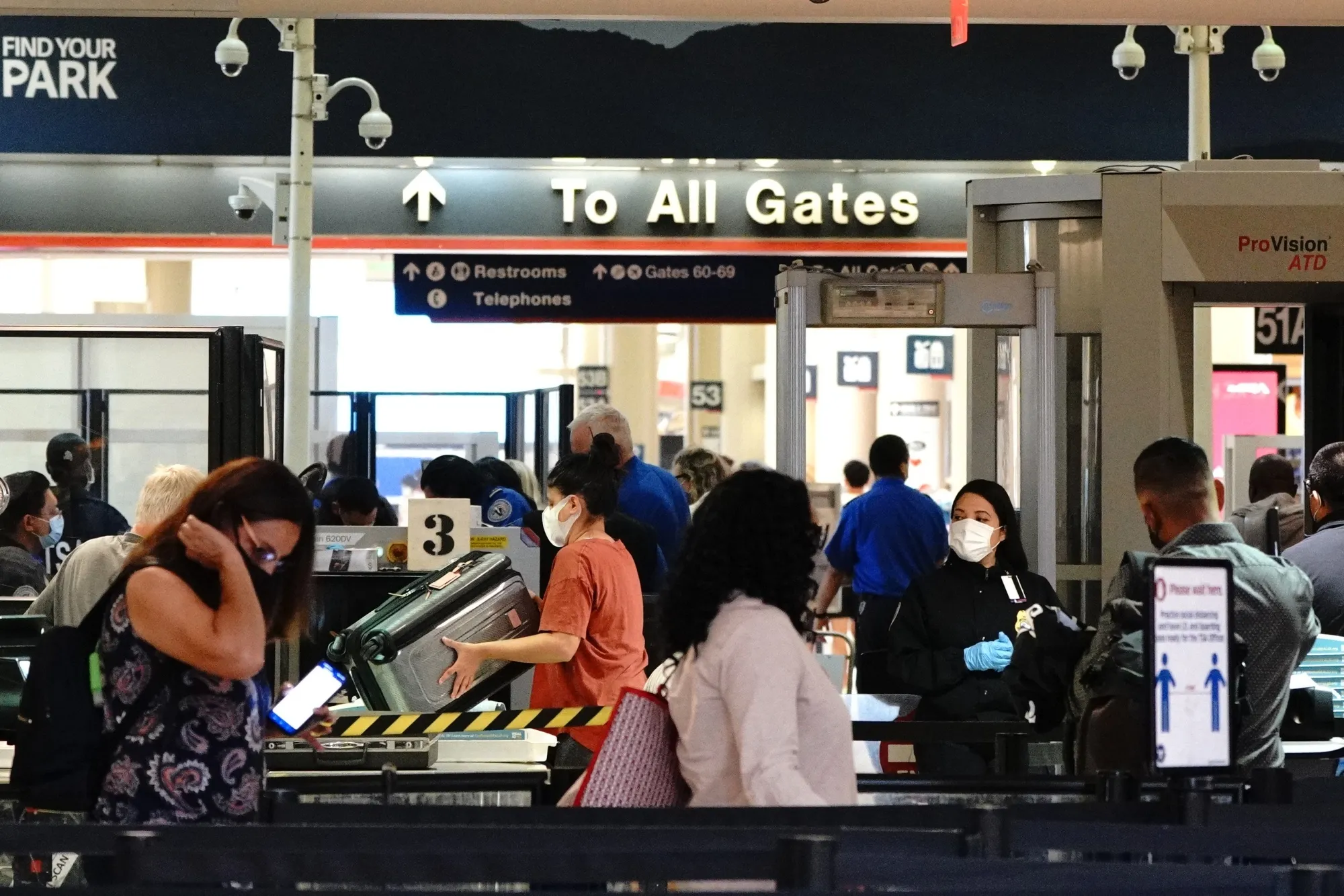 Now boarding at Gate 53.