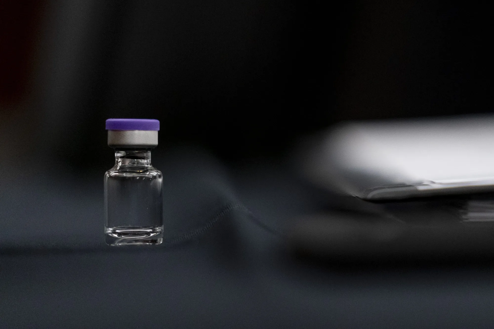 An example of the Pfizer Covid-19 vaccine vial at a Senate Commerce Committee hearing.