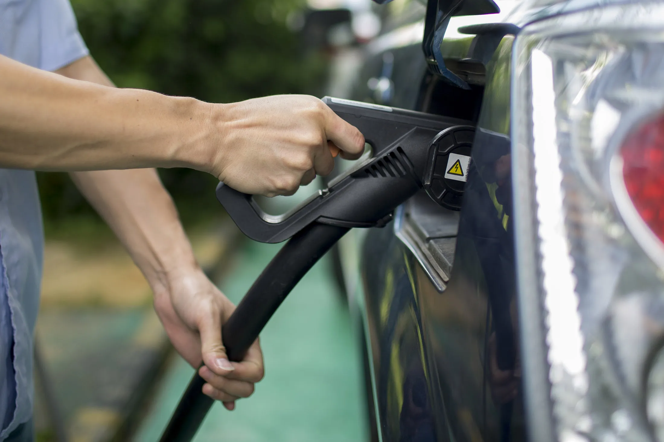 An electric vehicle is charged in Shenzhen, China.&nbsp;