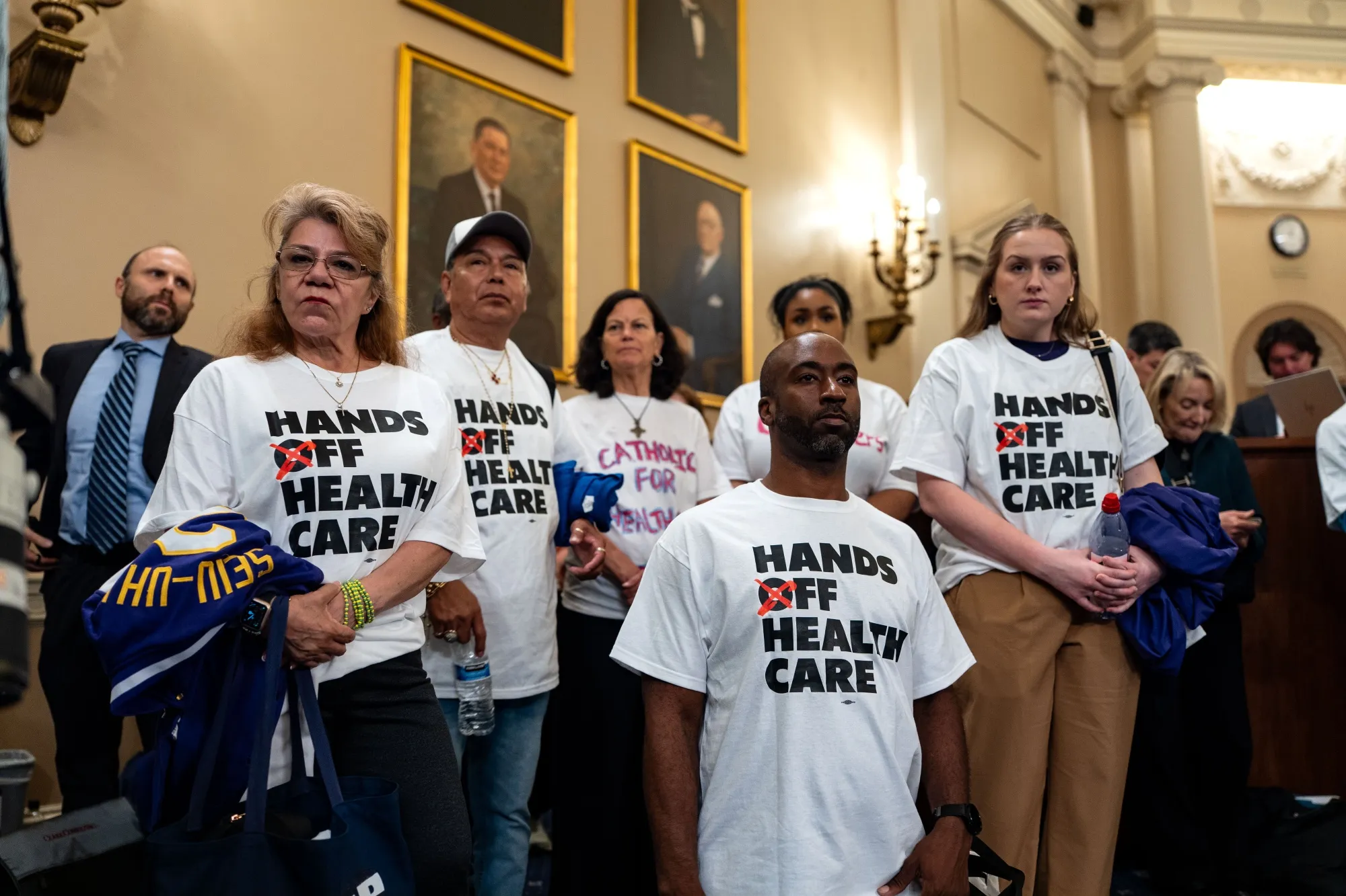 Demonstrators during a markup of President Donald Trump’s tax package in Washington, DC, on May 13.