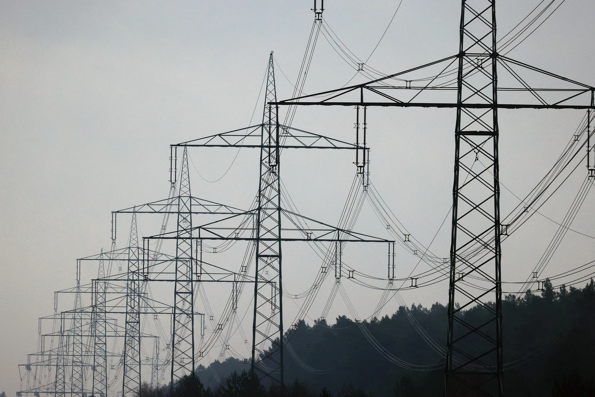 High voltage electricity transmission towers in Radeland, Germany.