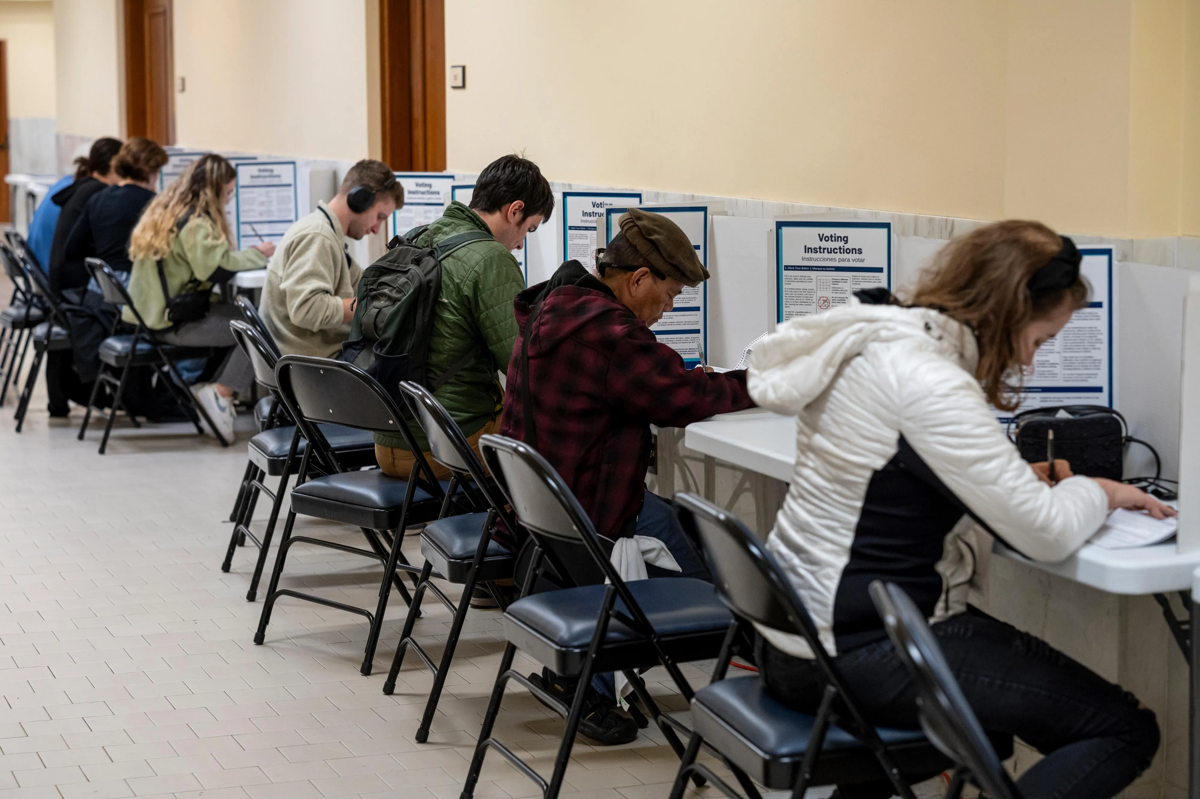 Voters mark their ballots at a polling location inside City Hall during early voting in San Francisco&nbsp;on Oct. 31.