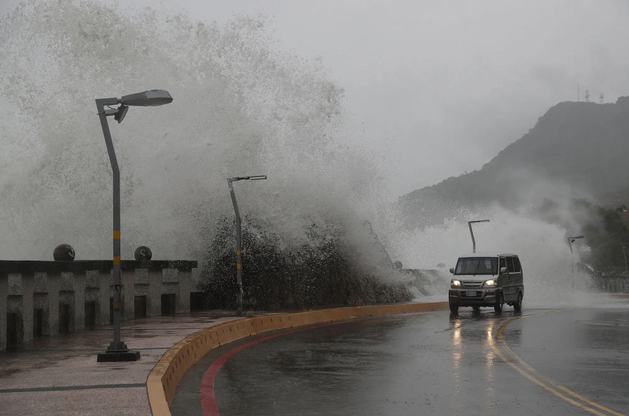 High waves crashes the shore in Kaohsiung, southern Taiwan on Oct. 2.
