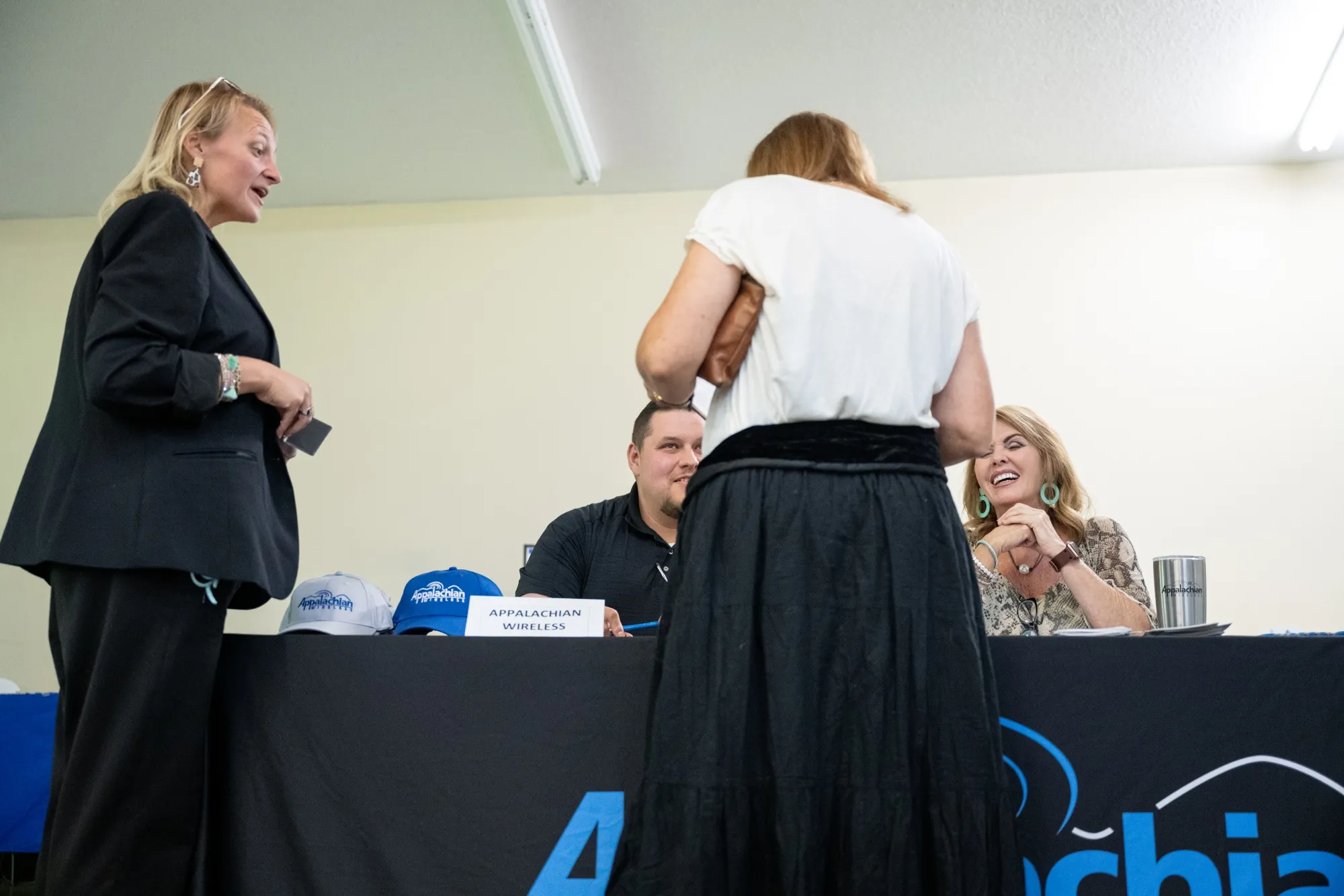 A job seeker speaks with recruiters&nbsp;during a job fair in Beattyville, Kentucky, U.S.