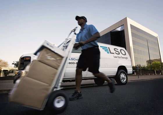 FedEx, UPS Turn Record Holiday Surge Into Someone Else’s Problem