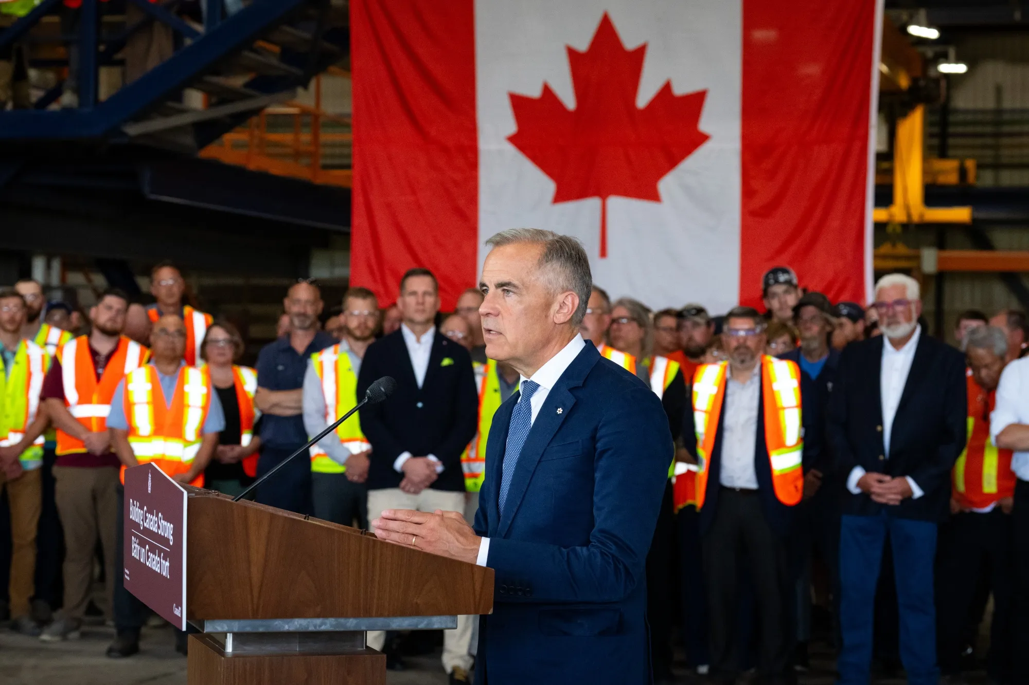 Mark Carney at the Walters Group steel construction facility in Hamilton, Ontario, on July 16.