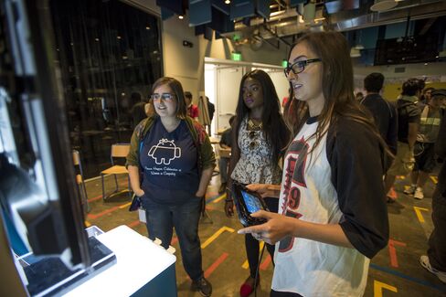 Attendees play Super Mario Maker during a hackathon at the Facebook headquarters in Menlo Park, Calif., on July 29, 2015.
