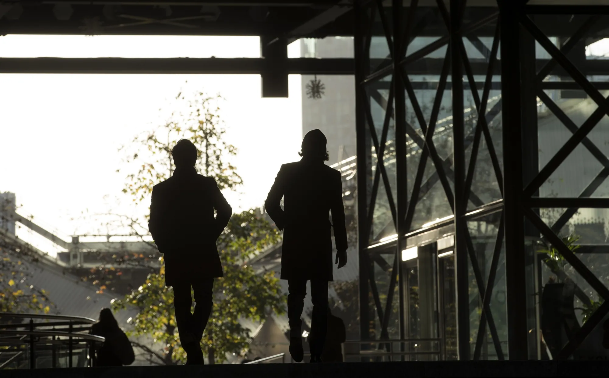Commuters walk through the City of London.