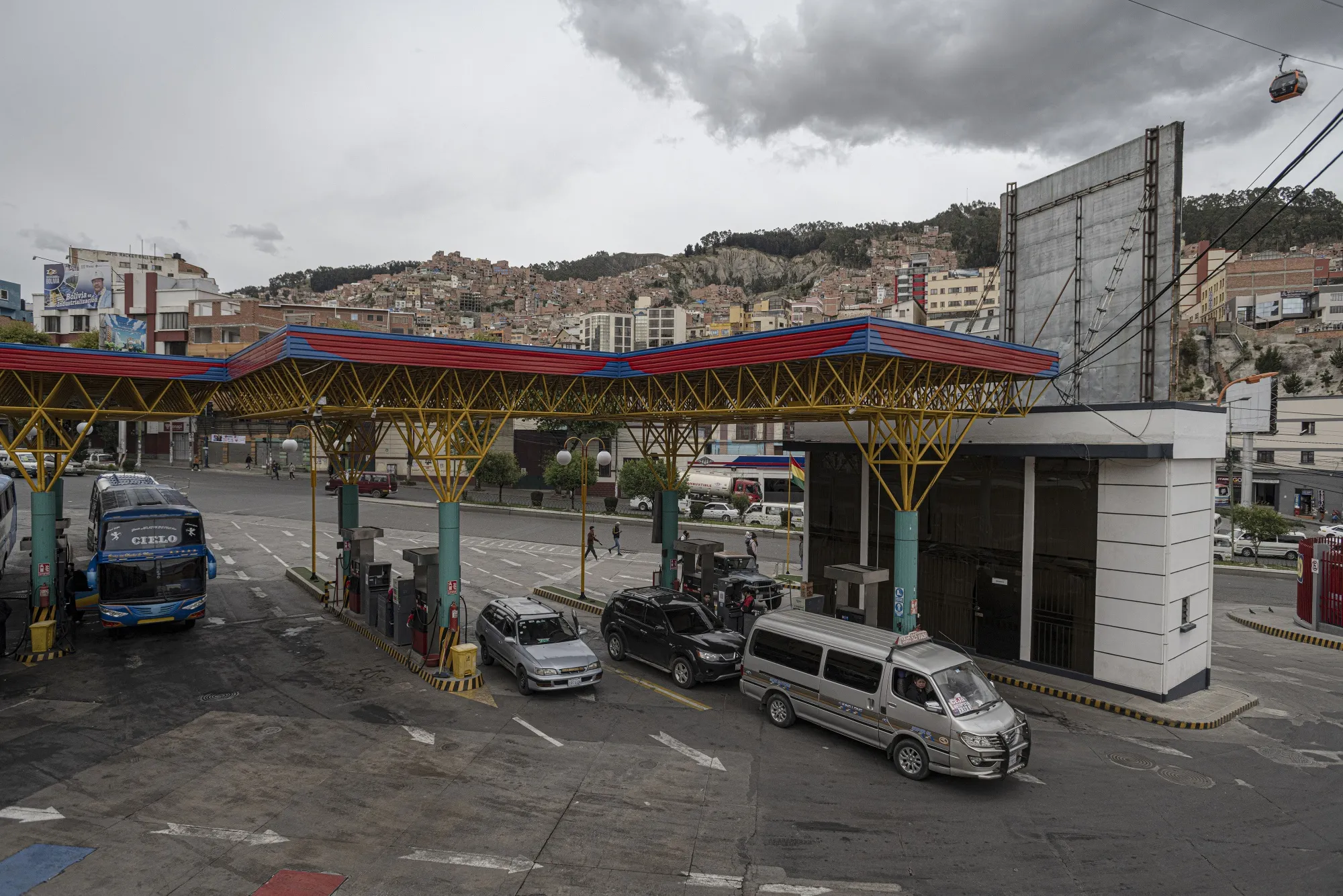 Vehicles refuel at a gas station in La Paz.