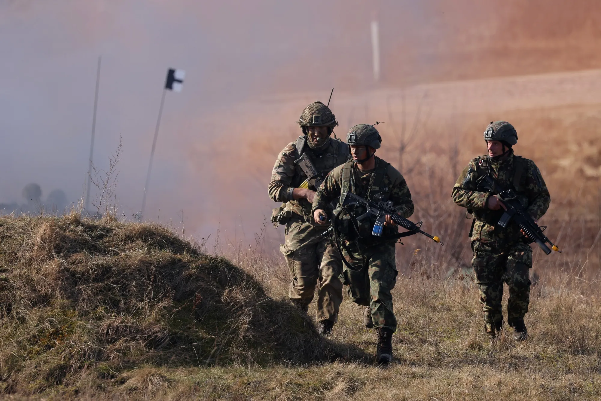United Kingdom soldiers&nbsp;storm an enemy position in a simulated attack during the NATO&nbsp;military exercise&nbsp;in Drawsko Pomorskie, Poland.&nbsp;