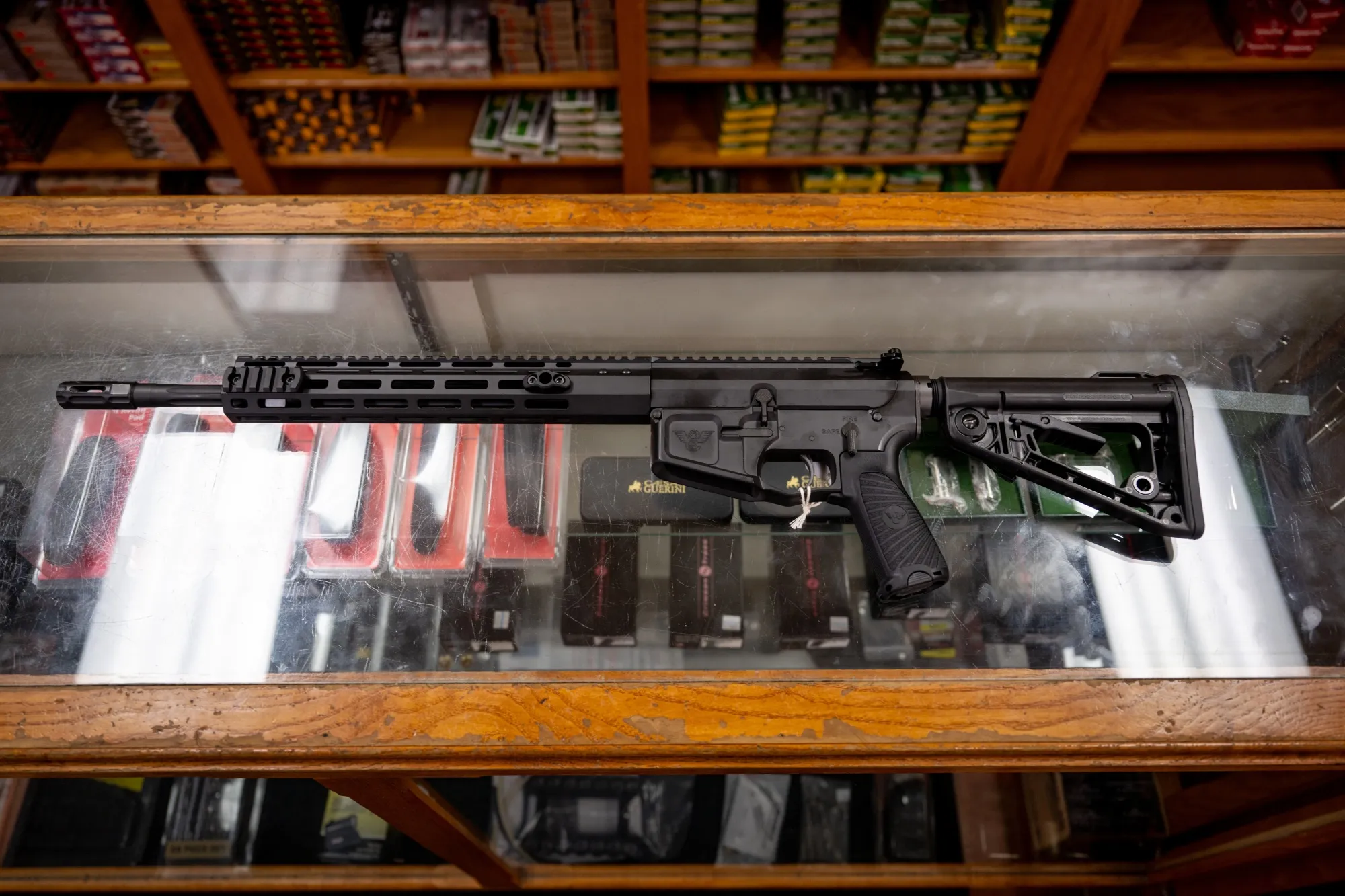 A semi-automatic AR-15 rifle in a gun store.