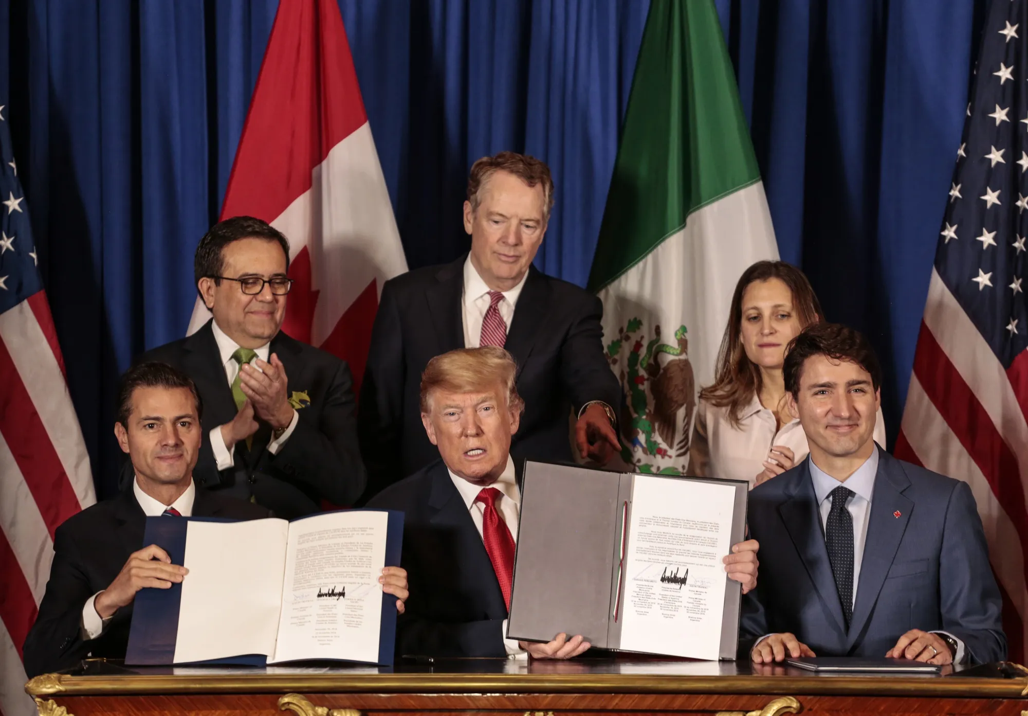 Enrique Pena Nieto, Mexico's ex-president, U.S. president Donald Trump, and Justin Trudeau, Canada's prime minister.