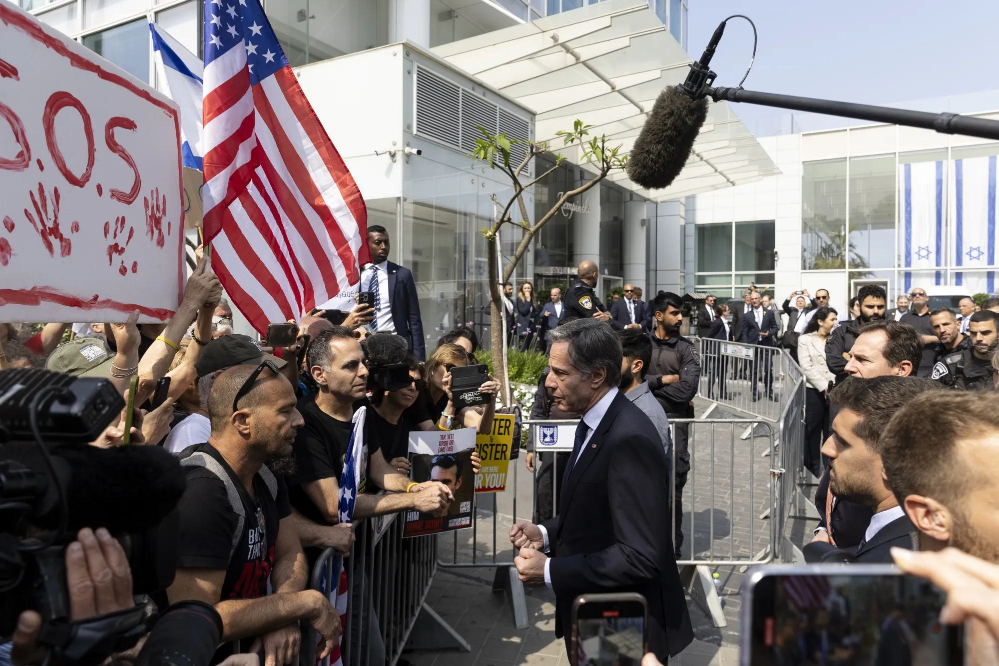 Antony Blinken meets with demonstrators seeking the return of the hostages held by Hamas, outside his hotel in Tel Aviv, on May 1.