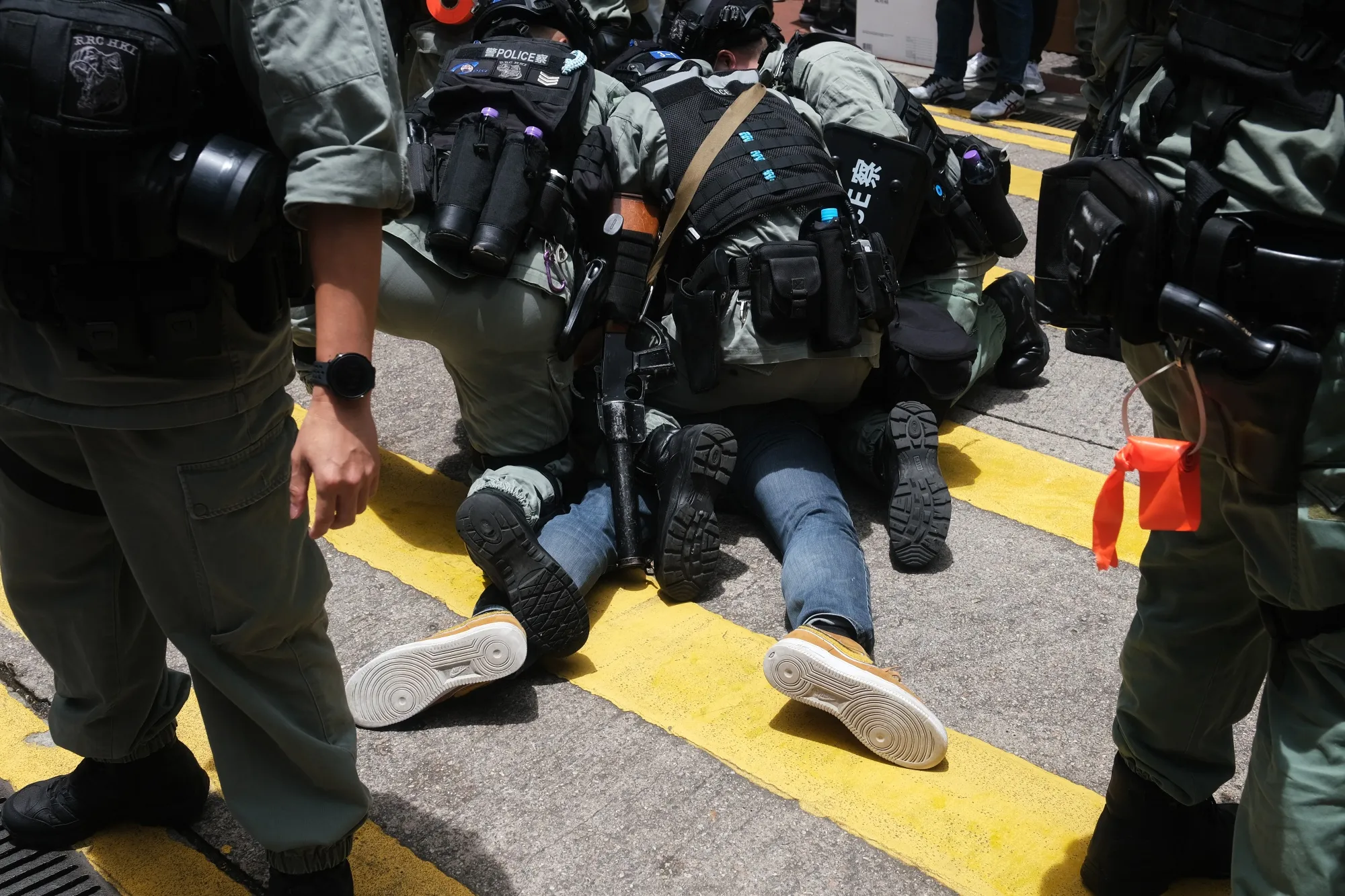 Police make an arrest during a protest in Hong Kong on July 1.
