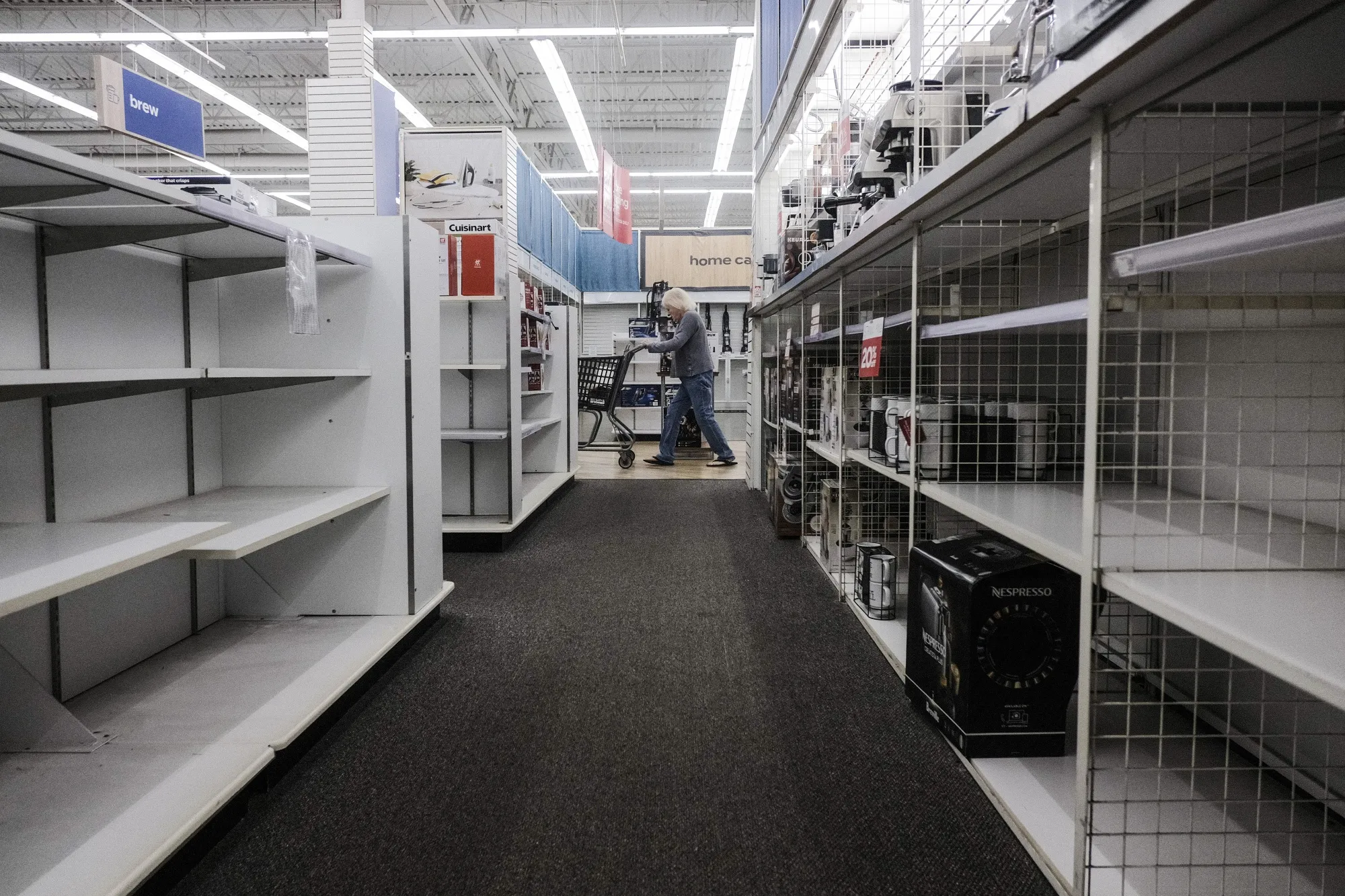 Empty shelves at a Bed Bath &amp; Beyond location permanently closing in Northville, Michigan.