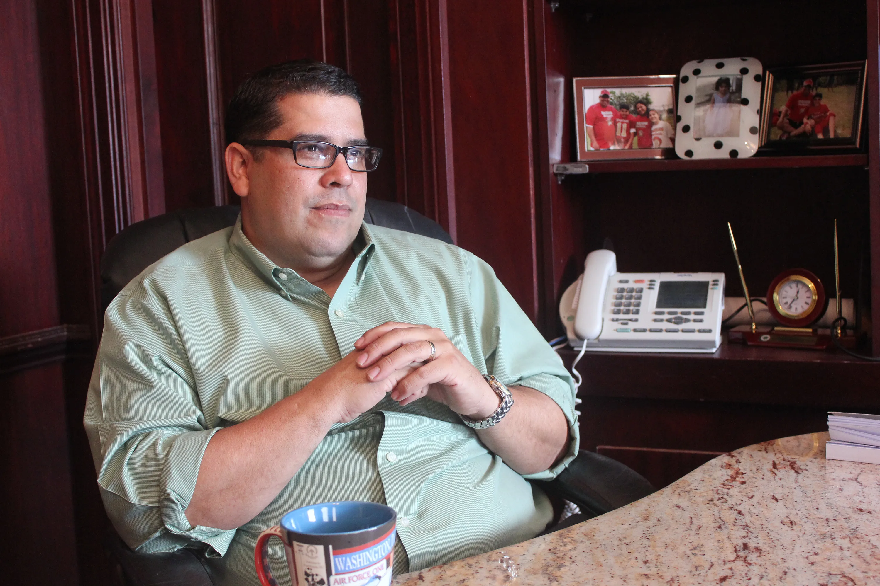 Representative Rafael Hernandez, chairman of the House Treasury Committee in Puerto Rico, discusses the government's financial crisis at his office in San Juan.
