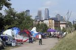 An encampment of homeless people outside Minneapolis, which just passed an ambitious zoning plan aimed at building more affordable housing throughout the city.