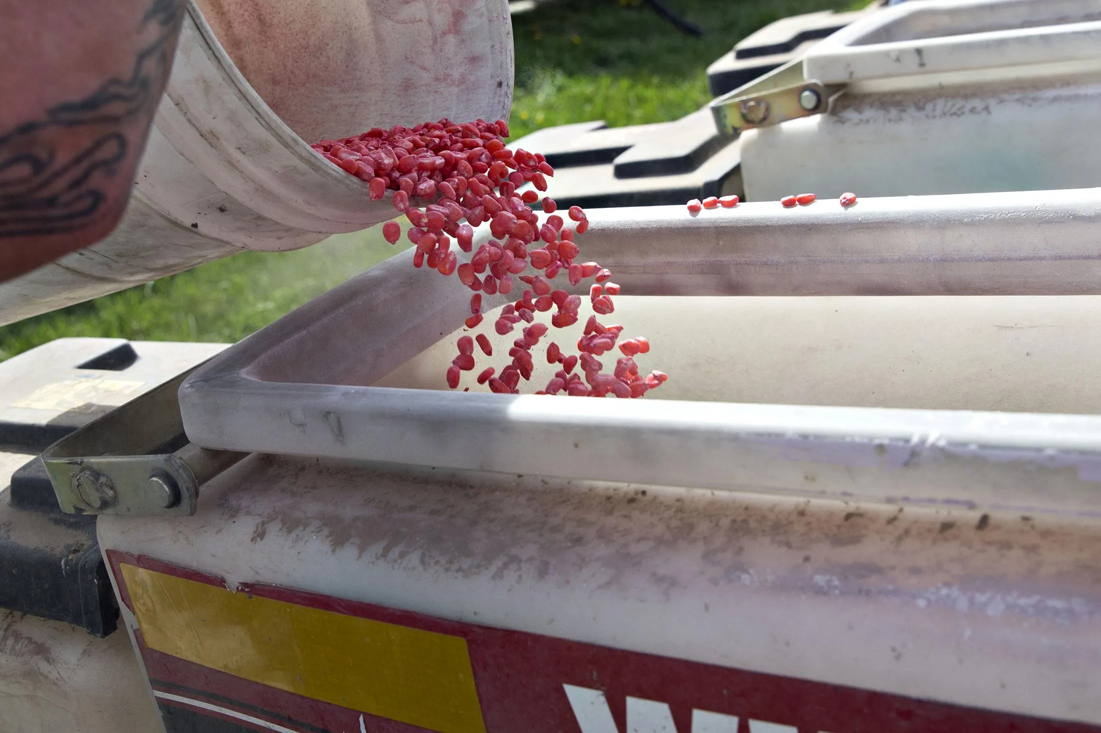 DuPont Pioneer hybrid corn is loaded into a Case IH planter in a field in Princeton, Illinois, U.S., on Monday, April 18, 2016.
