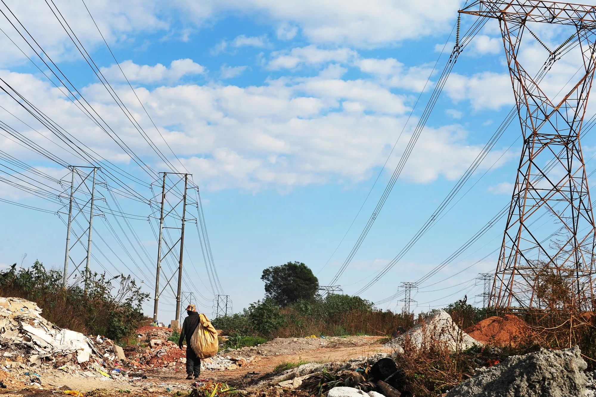 A waste collector at an informal settlement in Johannesburg.