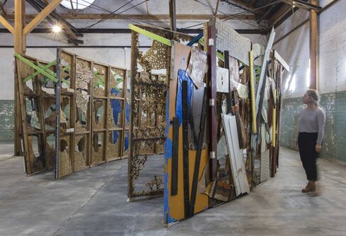 Abigail DeVille Intersection 2014 Reclaimed plywood theater flats, lumber, accumulated debris 8 x 17 x 14 ft / 2.44 x 5.18 x 4.27 m
