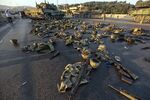 Army fatigues, helmets and weapons lay on the ground on Istanbul’s Bosphorus bridge on July 16.
