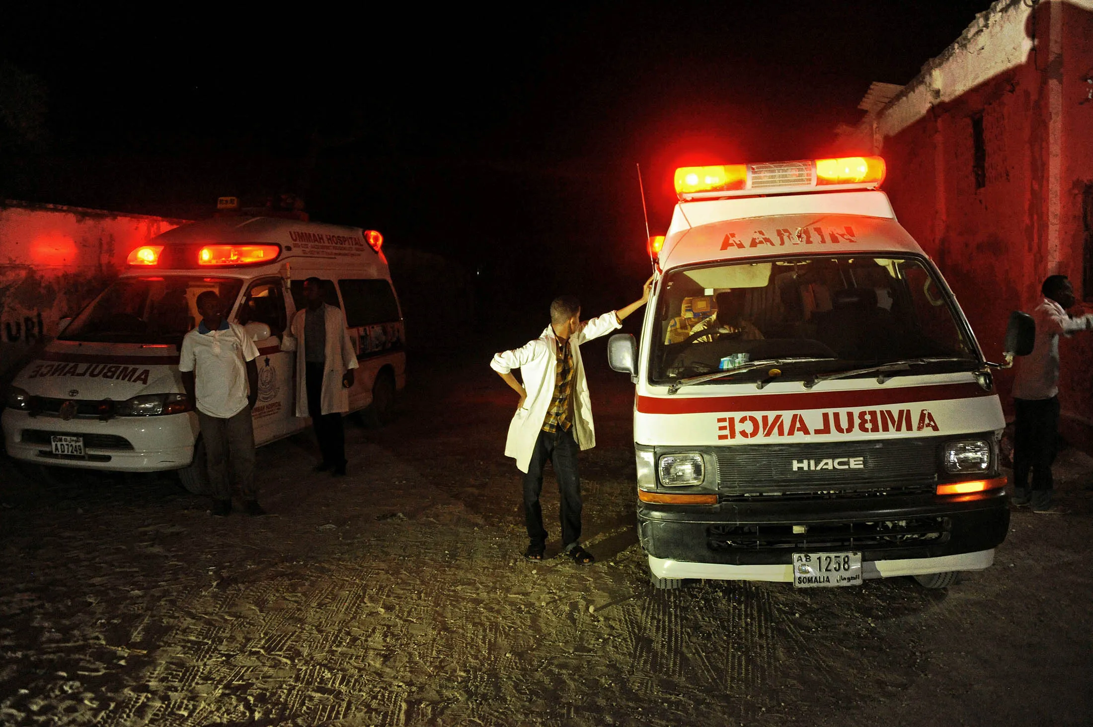 Two ambulances stand on the scene of a bomb attack in Lido Beach in Mogadishu on Thursday.
