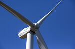 A Senvion SA logo sits on the nacelle of a wind turbine tower operated by EDP-Energias de Portugal SA.