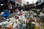 Mourners leave flowers near the site of a deadly crowd crush in the Itaewon district of Seoul, on Oct. 31.