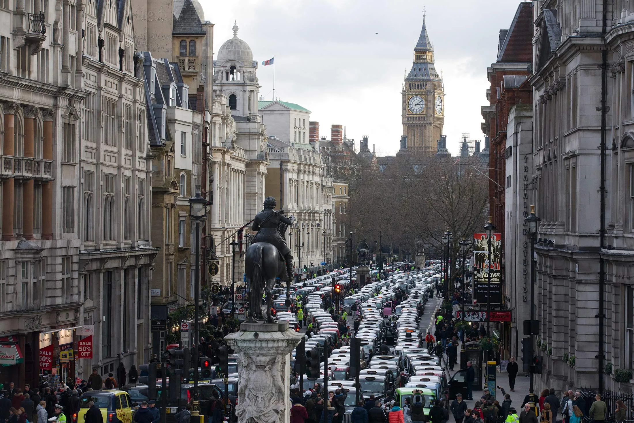 Taxi drivers block Whitehall as they demonstrate against Uber in central London on Feb. 10, 2016.
