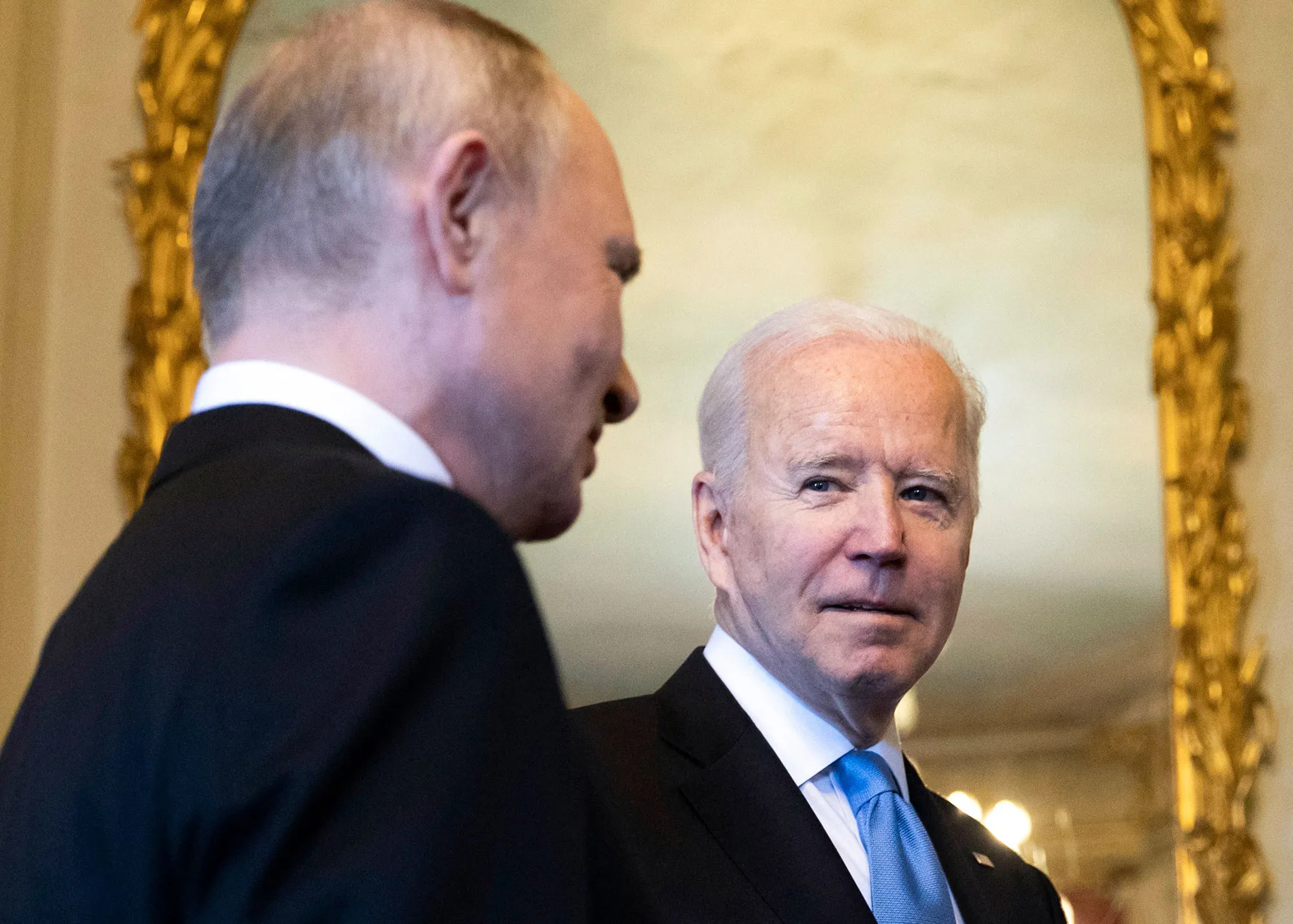 Joe Biden, right, speaks to Vladimir Putin prior to the U.S.-Russia summit at the Villa La Grange, in Geneva on June 16.