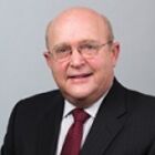 Headshot of John D White