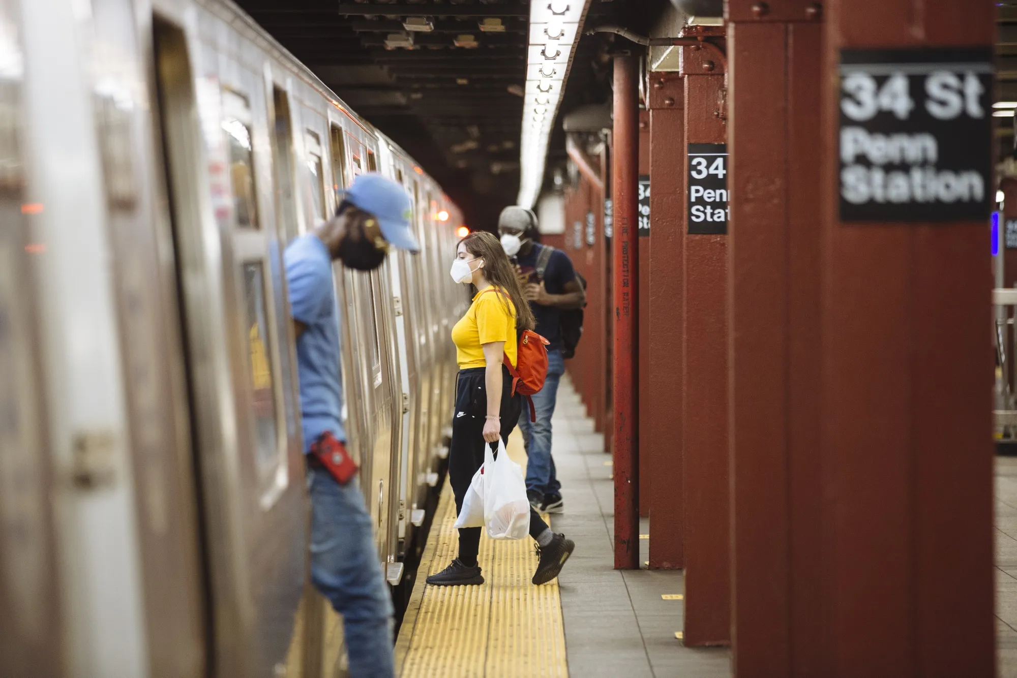 Commuters during rush hour at the 34 Street-Penn Station subway station in New York.