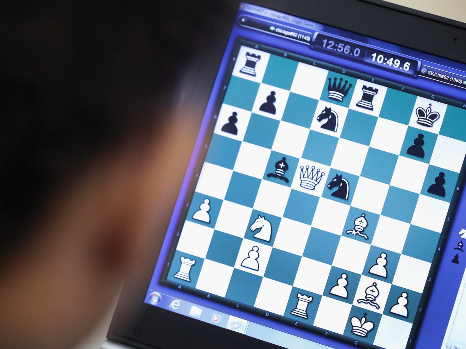 World Champion chess master Garry Kasparov studies the board during News  Photo - Getty Images