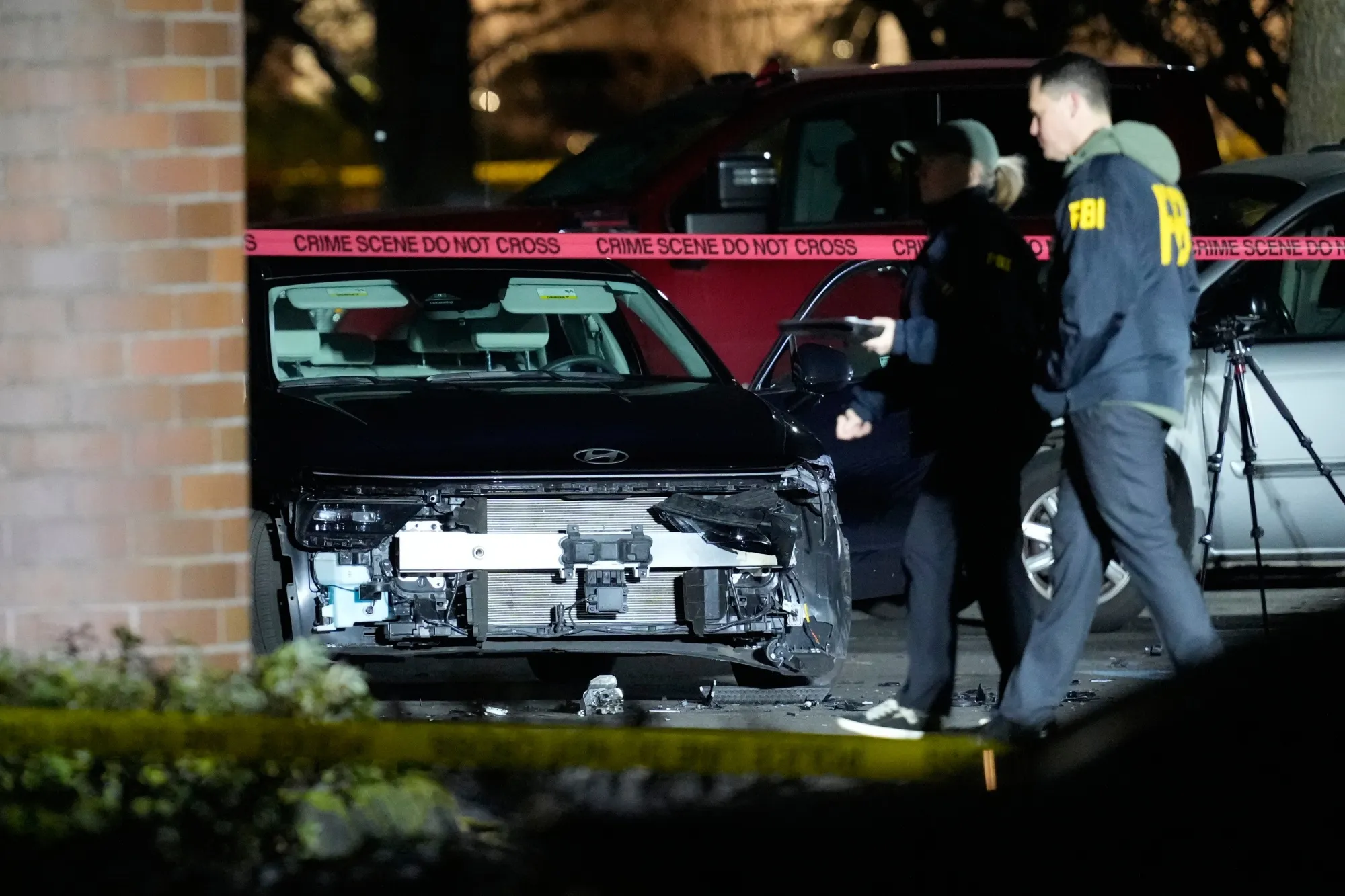 Law enforcement officials at the scene of a shooting in Portland on Jan. 8.