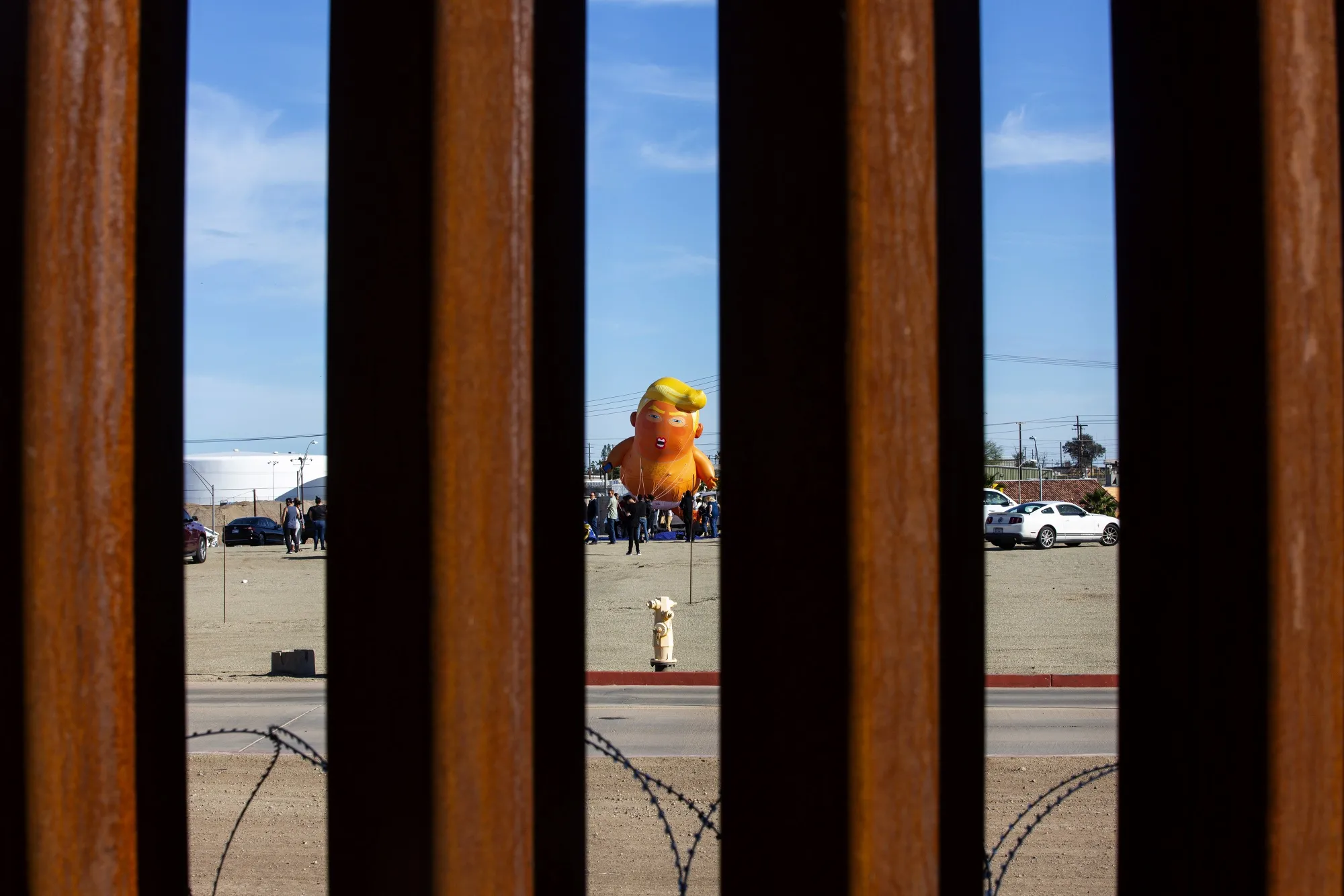 An anti-Trump protest in Calexico, California, ahead of his visit is seen across from the U.S.-Mexico border in Mexicali, Mexico.