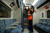 An employee of Transport for London cleans the drivers cabin door during a deep clean operation of a train used on the Victoria Line of London Underground network, at the Northumberland Park Railway Depot, operated by Transport for London, in London, U.K.
