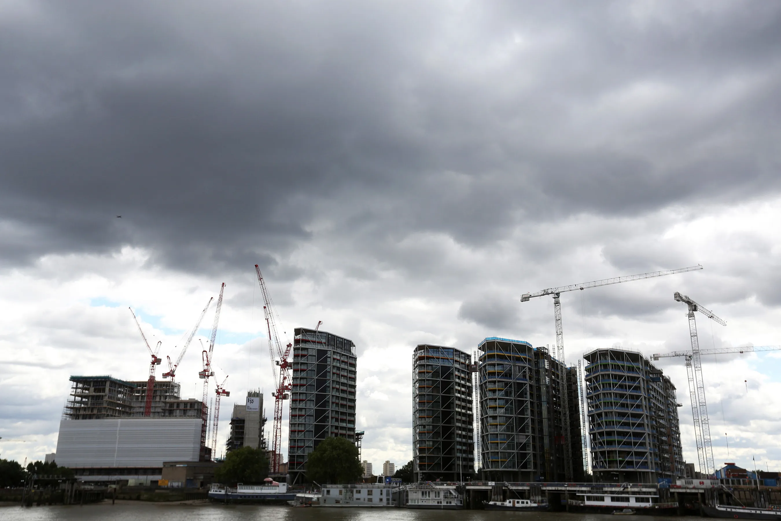 Cranes Stand above Apartment Developments in Nine Elms in London
