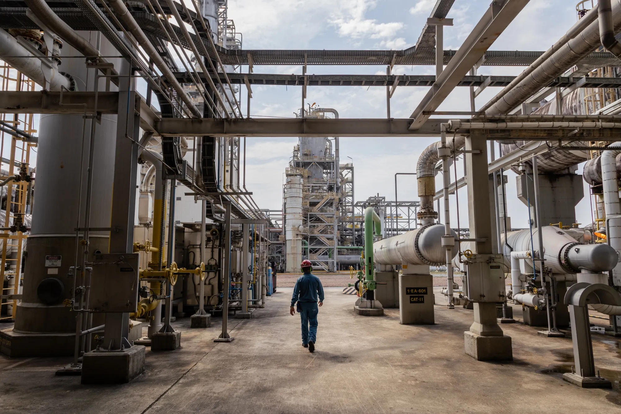 A worker at the Braskem petrochemical plant in Duque de Caxias, Brazil.