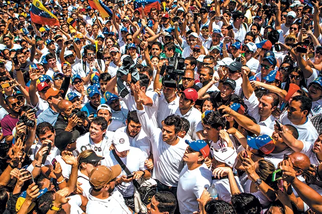 López surrounded by supporters in Caracas on Feb. 18