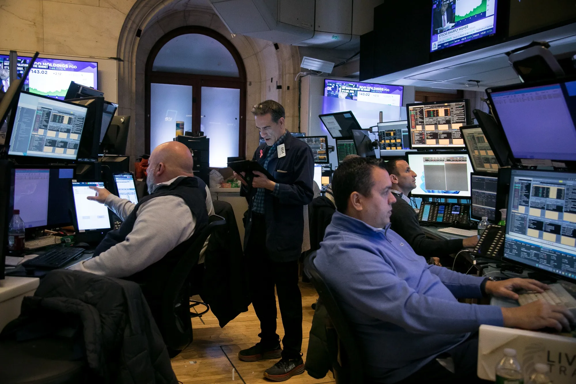 Traders work on the floor of the New York Stock Exchange.
