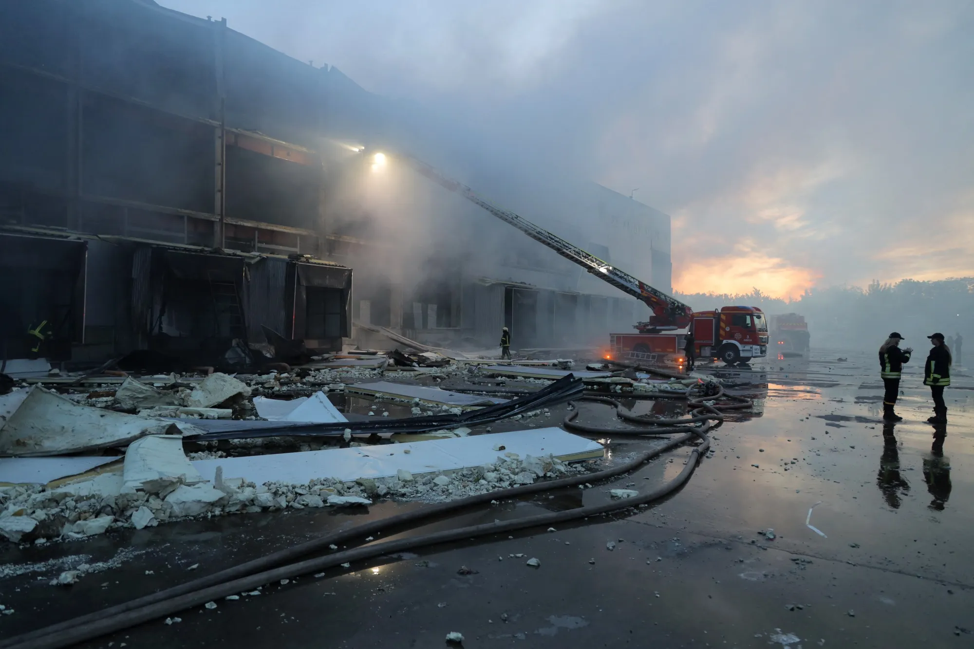 Ukrainian firefighters put out a fire in food warehouse after Russian missile strike to Odesa.